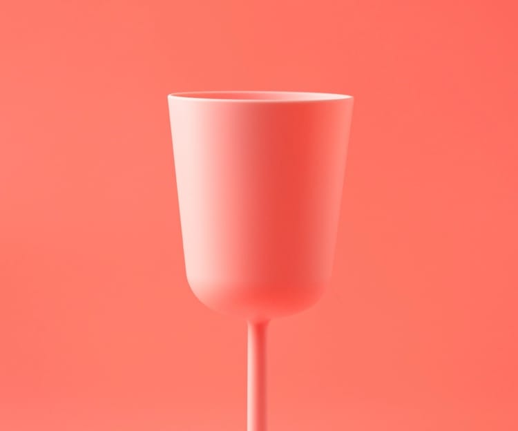 Pink glass on pink background